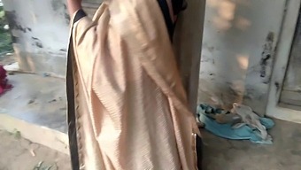 Indian Mature Woman With A Large Buttocks Nurses Her Own Breasts On A Farmstead