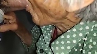 Elderly Asian Woman'S Passionate Encounter