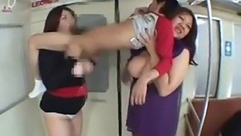 Two Voluptuous Japanese Women Indulge In Hardcore Titty-Fuck And Handjob